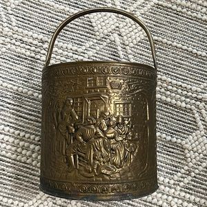 Vintage brass bucket with pub scene